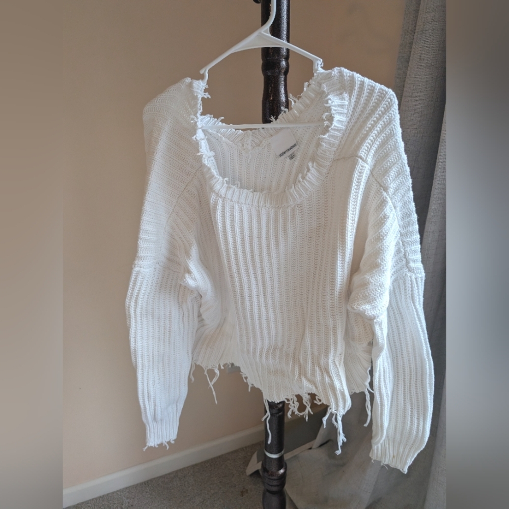 Cropped frayed sweater from Anthropologie
